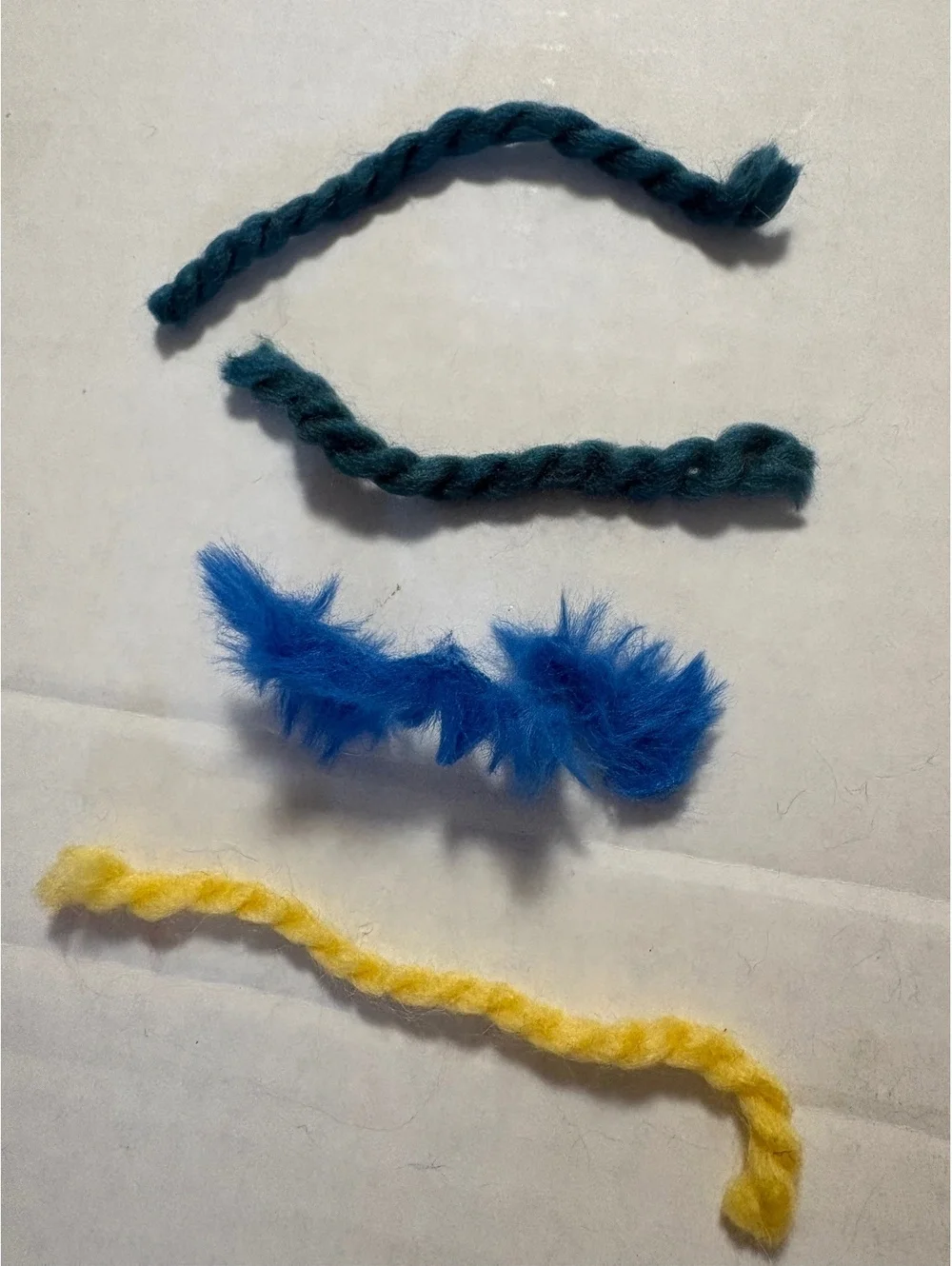Less than 5 inches yarn pieces